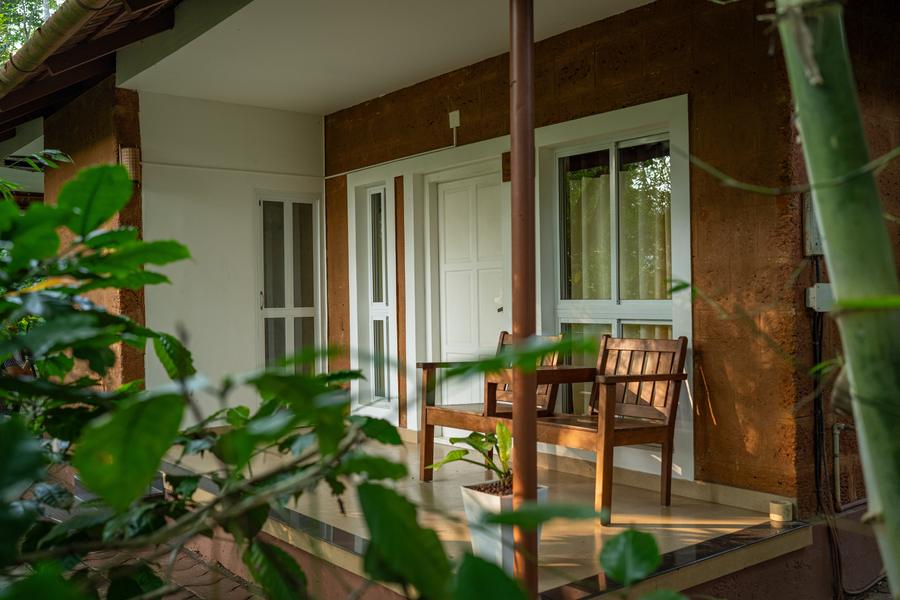 Cottage veranda with timber chairs