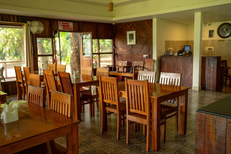 Restaurant dining room with timber tables and chairs